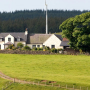 Lochfield Farm wide angle view with forrest in the background